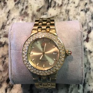 EcKo Men’s Gold Tone Watch with beautiful stones.